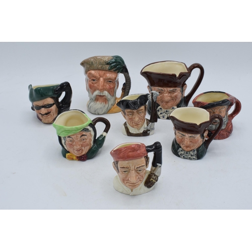 68 - A collection of small and miniature character jugs to include Robinson Crusoe, Blacksmith, Gunsmith ... 