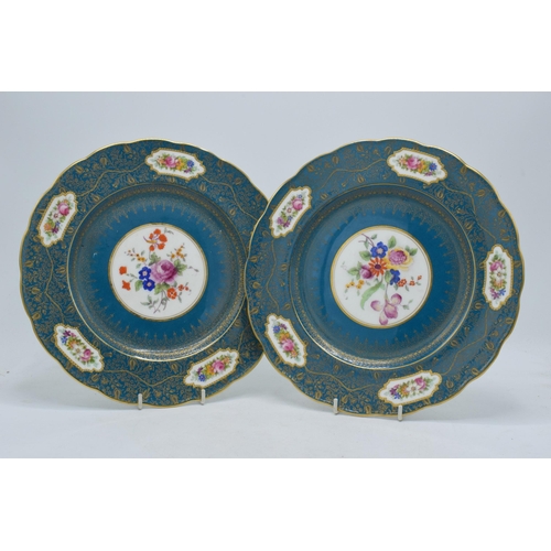 90 - A near pair of George Jones & Sons Crescent China cabinet plates with floral and gilt design and sha... 