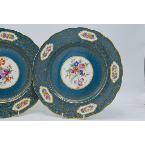 90 - A near pair of George Jones & Sons Crescent China cabinet plates with floral and gilt design and sha... 