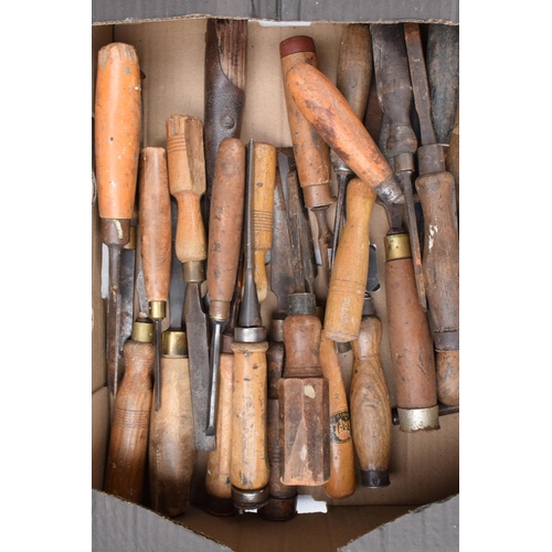 330A - A mixed collection of chisels and woodworking tools to include makes such as Marples and Colone with... 