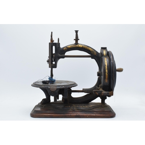 Late 19th century Prima Donna hand propelled sewing machine.