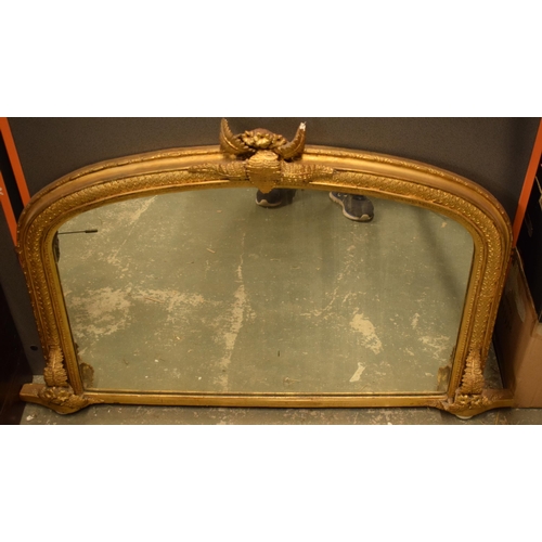 376 - 19th century over mantel mirror of arched form with gilt moulded frame with fern detail, 114cm wide.