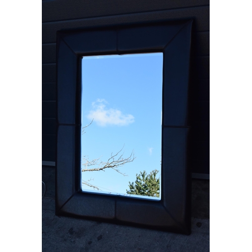 341B - Leather bound wall mirror, 106 x 80cm tall.