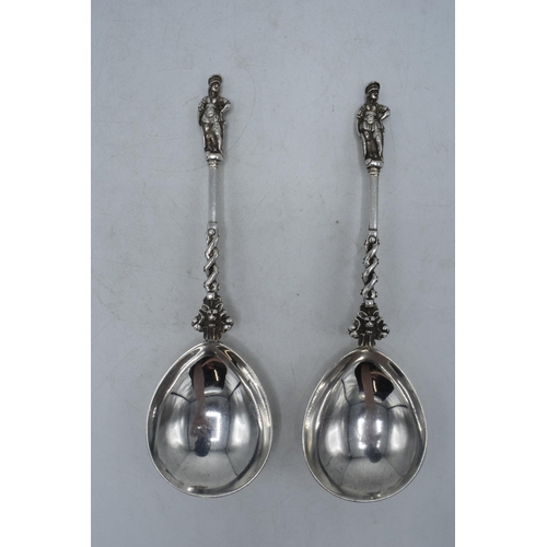 205E - A pair of ornate Victorian silver spoons, London 1874, 126.1 grams. 19.5cm long.