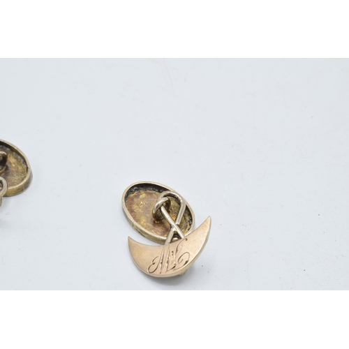 205O - 15ct gold cufflinks with initials, 5.3 grams.