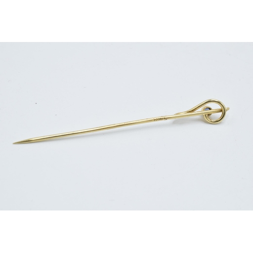 205P - 9ct gold stick pin set with sapphire, 1.2 grams, 6cm long.