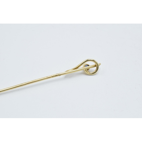 205P - 9ct gold stick pin set with sapphire, 1.2 grams, 6cm long.