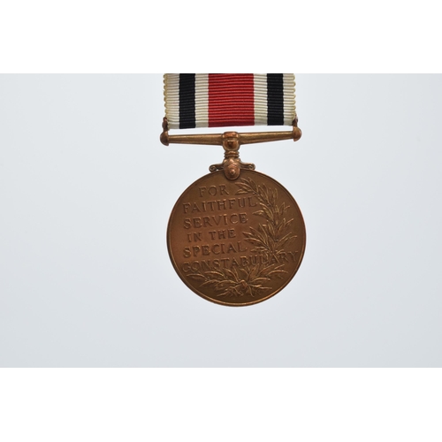 246F - George V medal For Faithful Service in the Special Constabulary Ernest Hopkins.