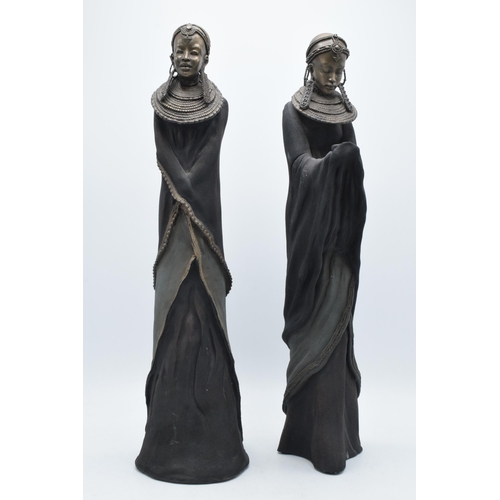 237 - A pair of Soul Journeys Maasai heavy resin figures, limited edition, with certificate plaque, 46cm t... 