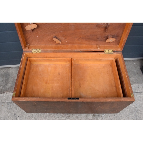 254 - Vintage wooden tool box on caster wheels with pull out drawers, 84 x 43 x 48cm tall.