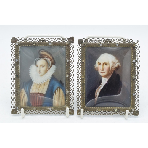 269 - A pair of antique miniatures in wire frames with bowed glass, 10.5cm tall.