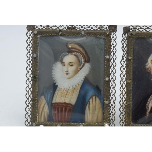 269 - A pair of antique miniatures in wire frames with bowed glass, 10.5cm tall.