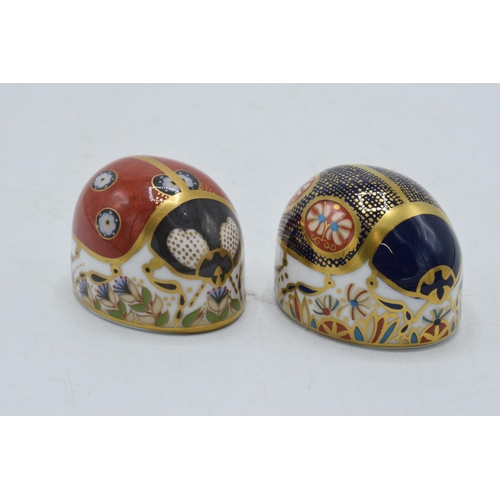 31 - Royal Crown Derby paperweights to include Blue Ladybird with four spots together with Red Ladybird w... 