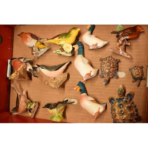 51 - A collection of Beswick birds to include Greenfinch, Bullfinch and others, Wade Tortoises, ducks and... 