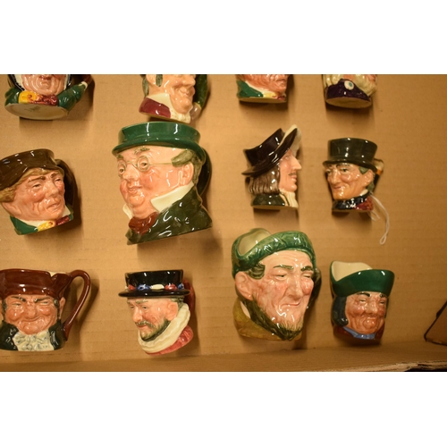 79 - A collection of small and miniature Royal Doulton character jugs to include Bacchus, John Peel, Robi... 