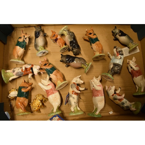 84 - A collection of Beswick pig band figures to include David, John and Daniel amongst others (16) (miss... 