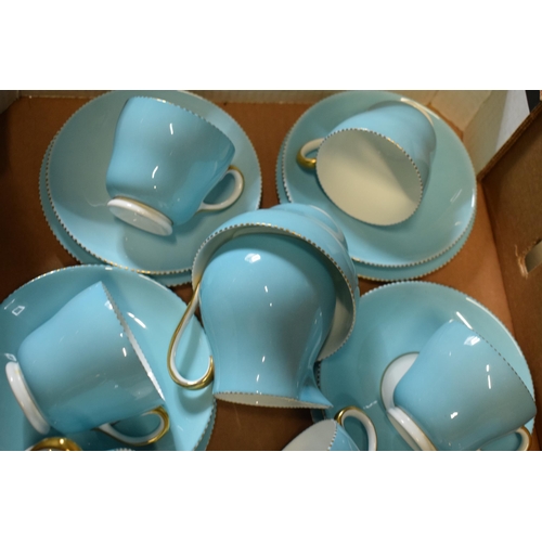 85A - A collection of Wedgwood light blue and gilded tea ware to include 12 cups, 12 saucers, 12 side plat... 