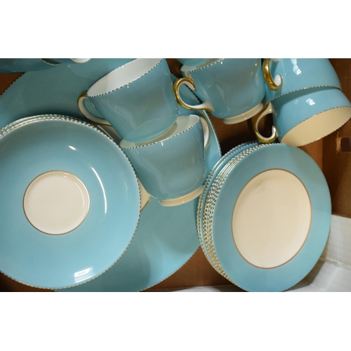 85A - A collection of Wedgwood light blue and gilded tea ware to include 12 cups, 12 saucers, 12 side plat... 