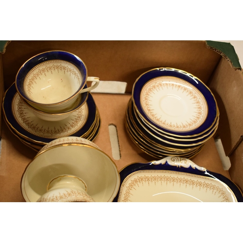 85B - A collection of Royal Worcester Regency tea ware to include a cake plate, 15 cups (2 different model... 