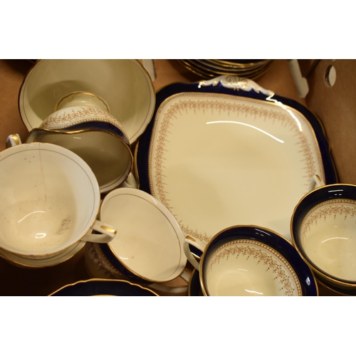 85B - A collection of Royal Worcester Regency tea ware to include a cake plate, 15 cups (2 different model... 