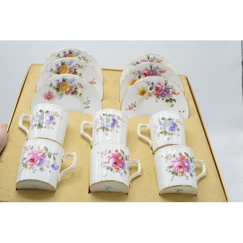 86 - A Royal Crown Derby boxed Posies pattern coffee service, comprising of six cups and saucers, in the ... 