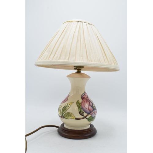 89 - Moorcroft lamp base with shade in the Pink Magnolia pattern, 25cm high to the top of the fitting