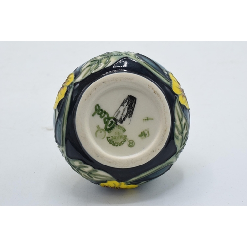 91 - Small Moorcroft squat vase with yellow floral design, 6.5cm diameter.