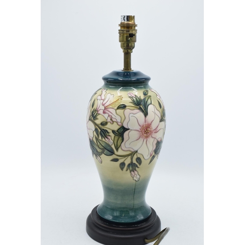 95 - Moorcroft Pottery Table Lamp, decorated in the Hibiscus Moon pattern, 39cm high including fittings.