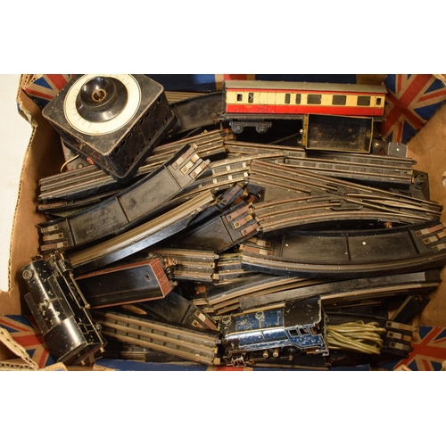 283 - A collection of Trix Twin Railway items to include engines, carriages, varying lengths of track and ... 