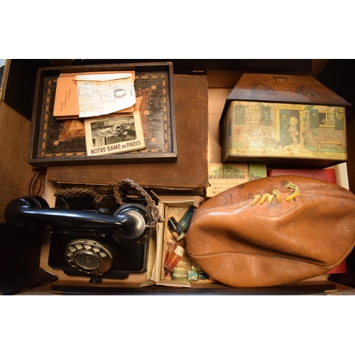 287 - A collection of items to include vintage Bakelite telephone, rugby ball, 19th century bible, 1930s L... 