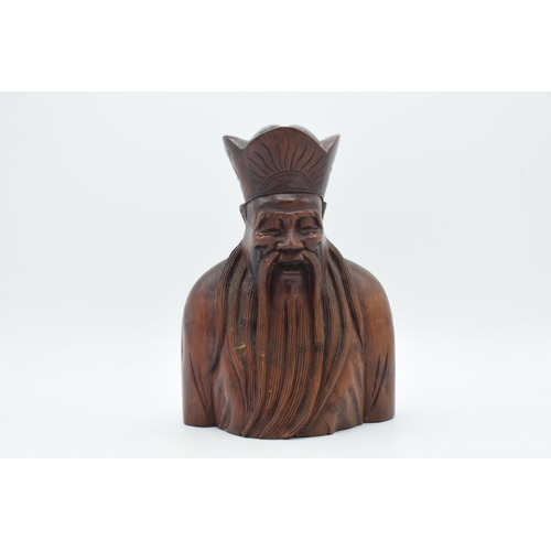 298 - Quality carved rosewood (or similar) oriental bust of a traditional gentleman, 21cm tall.