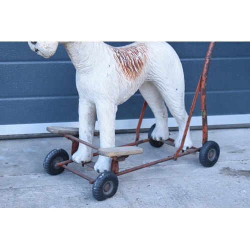 299 - Triang Lines child's walker Fox Terrier with original eyes, circa 1950s, 64cm long.