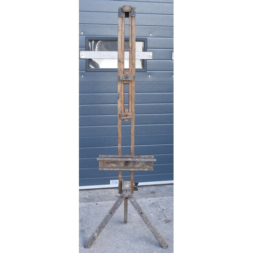 304 - Early 20th century folding artist's easel with heavy duty wingnut and remnants of paint, 190cm tall ... 