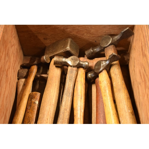 322 - A collection of vintage hammers with wooden handles of varying forms and sizes (Qty).