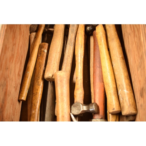 322 - A collection of vintage hammers with wooden handles of varying forms and sizes (Qty).