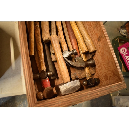 322 - A collection of vintage hammers with wooden handles of varying forms and sizes (Qty).