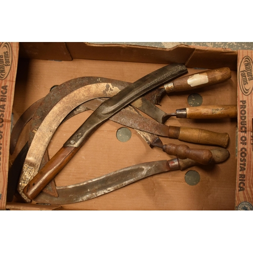 323 - A collection of vintage scythes and similar tools to include branded examples (collection only).