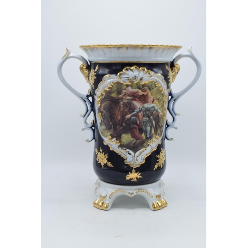 85G - A large Retier pottery double-handled pottery with romantical scenes with gilt decoration, 32.5cm ta... 