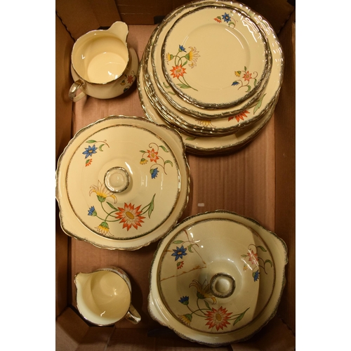 209 - A collection of Alfred Meakin tea ware in the Sunburt pattern to include plates, tureens, cups, sauc... 