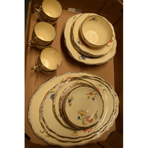 209 - A collection of Alfred Meakin tea ware in the Sunburt pattern to include plates, tureens, cups, sauc... 