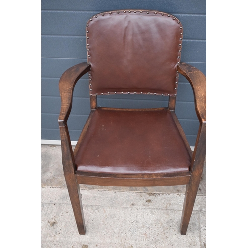 359 - A 19th century oak hall chair together with later upholstered arm chair, tallest 93cm tall (2).