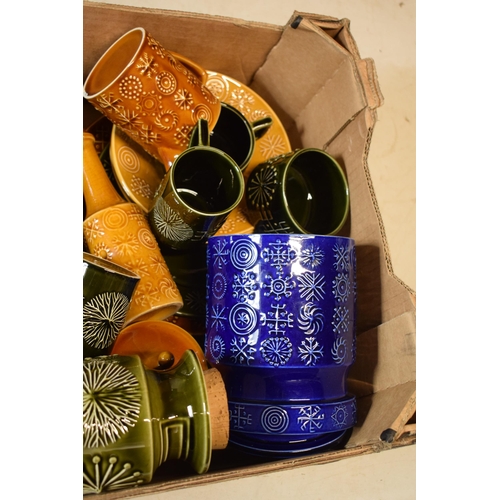 200A - A collection of Portmeirion pottery in the Totem pattern in varying colours and forms to include lar... 