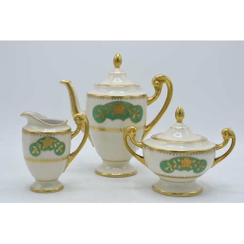 212 - A trio of continental pottery items to include coffee pot, milk jug and lidded sugar, 'Limosine AW K... 