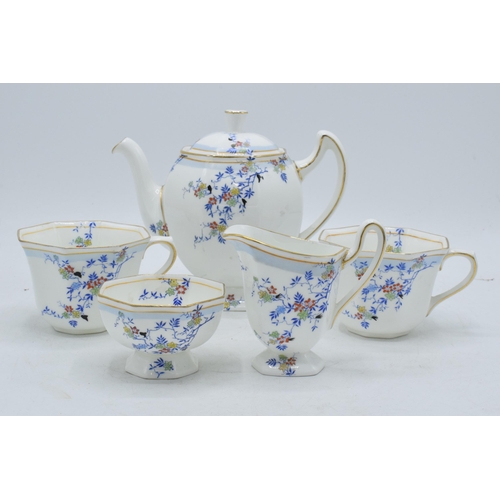 213 - Royal Doulton tea for two teaset H3917 pattern to include teapot, 2 cups, milk and sugar.