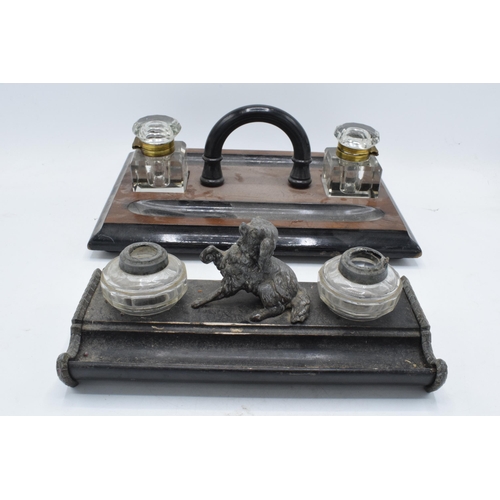 216 - A pair of antique desk tidies with ink pots, one with a dog (2).