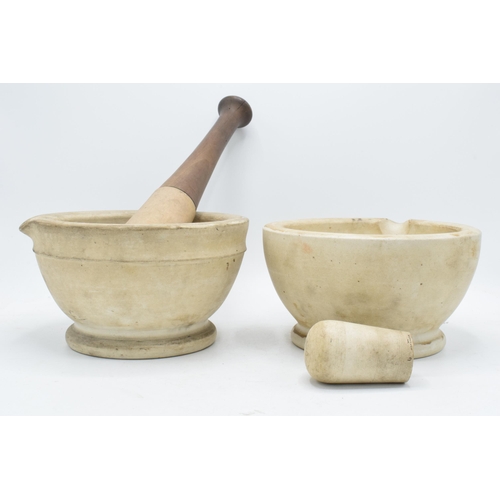 225 - A pair of late 19th / early 20th century mortar and pestles to include Wedgwood Best Composition exa... 