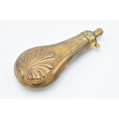 234 - 19th century copper embossed powder flask, 19cm long.