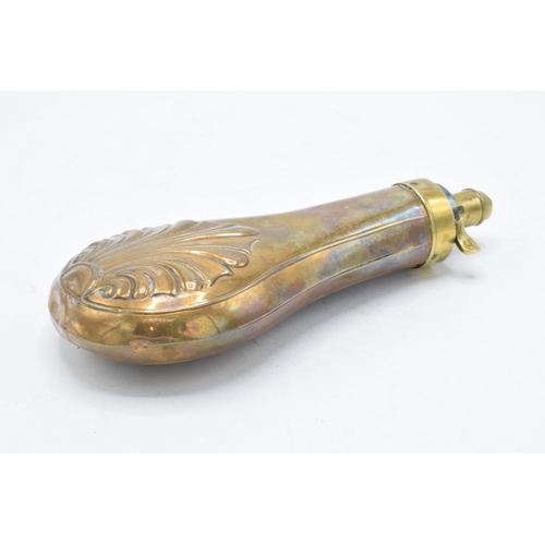 234 - 19th century copper embossed powder flask, 19cm long.