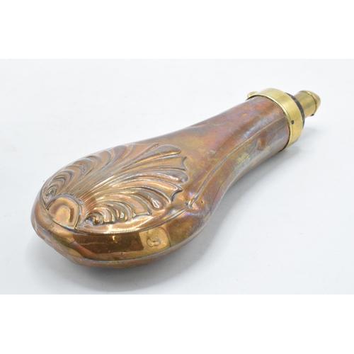 234 - 19th century copper embossed powder flask, 19cm long.