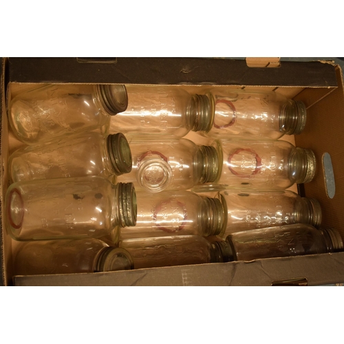 272 - A collection of Kilner jars, of varying sizes, with odd spare lids (Qty), collection only.